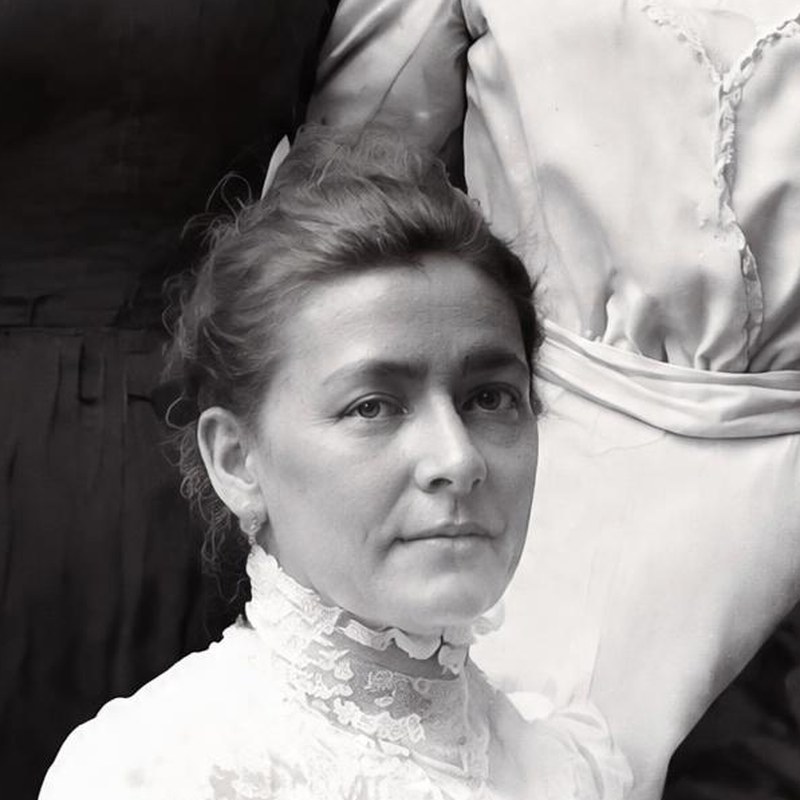 Second restore: an older woman with a broader face and lined forehead